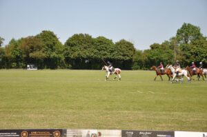 St Edmund's Student Charlotte leads the attack at a Polo match